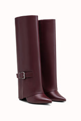 Bottes hautes talons carrés bouts pointus à rabats et boucles
