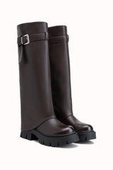 Bottes hautes à plateformes et boucles