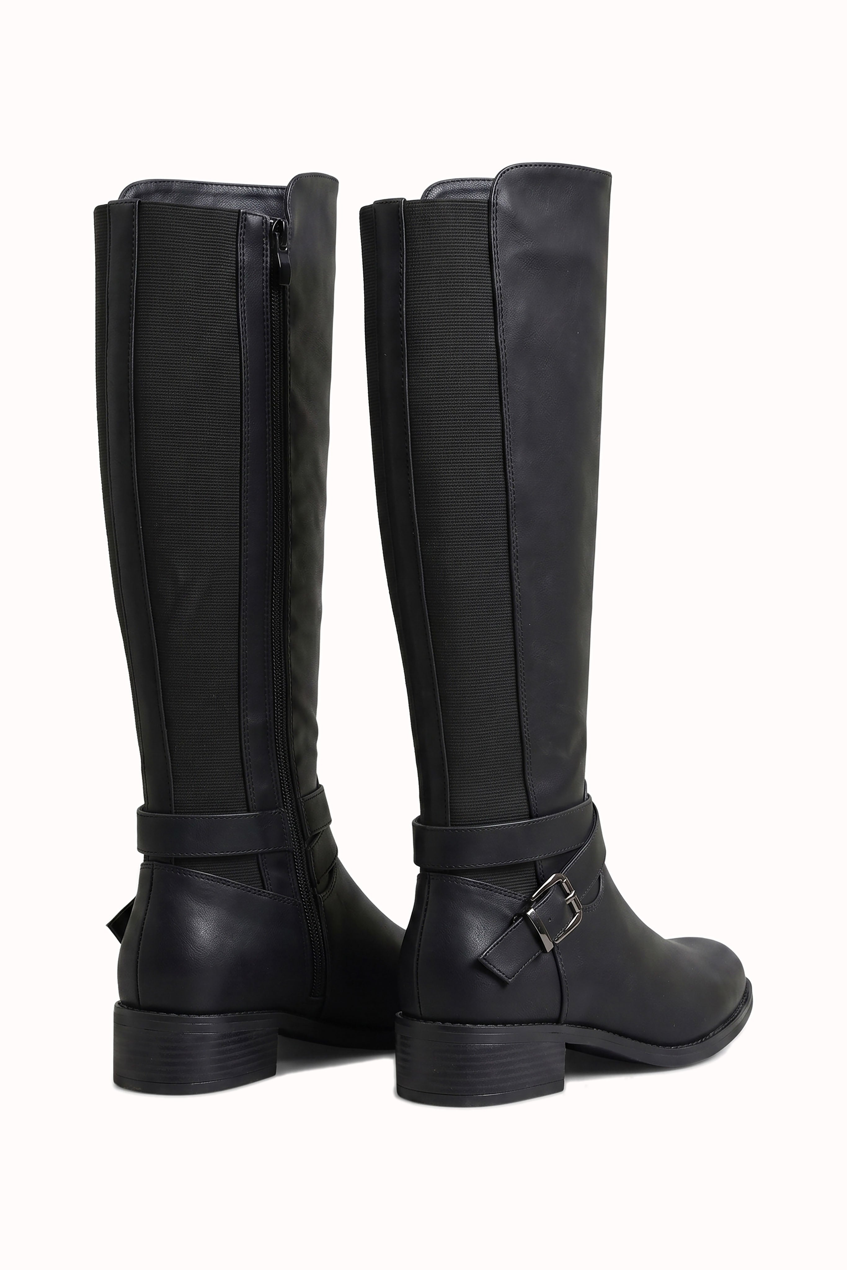 Bottes cavalières hautes à brides croisées et boucles